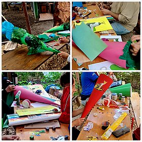 Fotocollage mit vielem bunten Bastelmaterien und farbigen Schultüten.